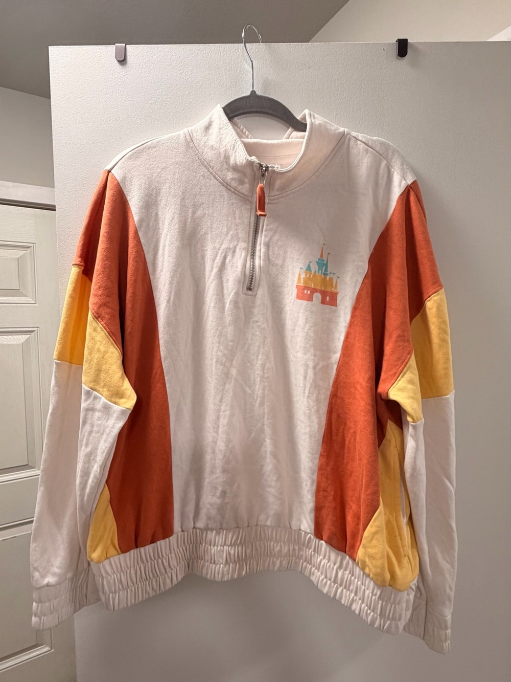 Disney Cream, Orange & Yellow Colorblock Quarter-Zip Sweatshirt